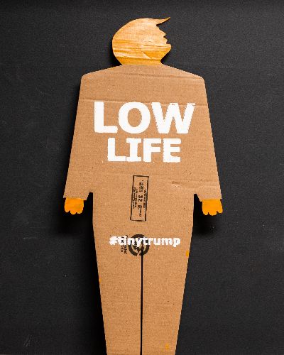 Same as previous image except the slogan is Low Life.