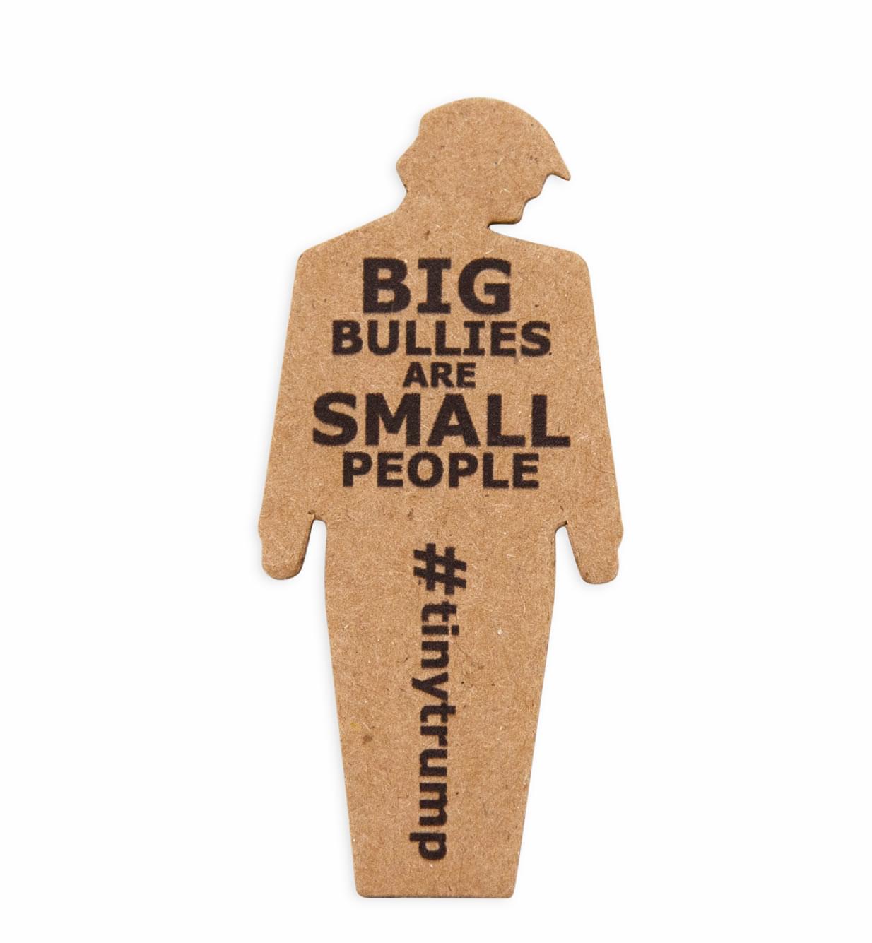 Close up of a tiny trump with the slogan \"Big Bullies Are Small People\"